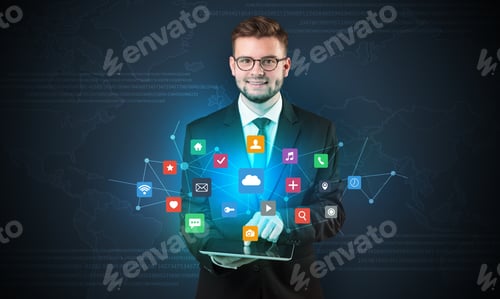 Preview: Handsome Businessman In Suit With Tablet On His Hand And Application Icons Above