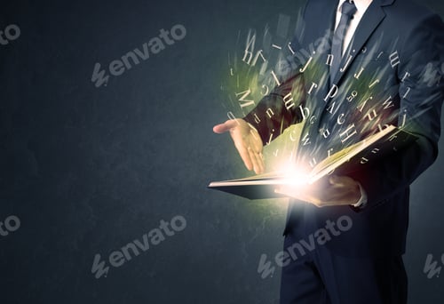 Preview: Businessman Holding Book With Letter Concept.