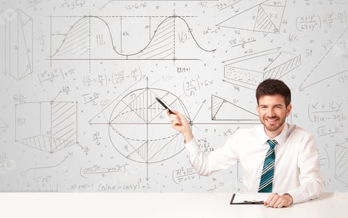 Preview: Business Man Sitting At White Table With Hand Drawn Calculations Background