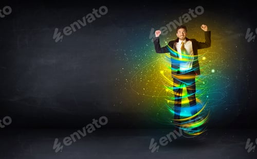 Preview: Excited Business Man Jumping With Energy Colourful Lines Around Him