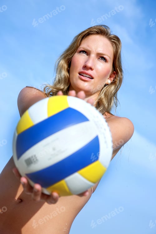 Preview: Beautiful Beach Volleyball Female Player With A Ball