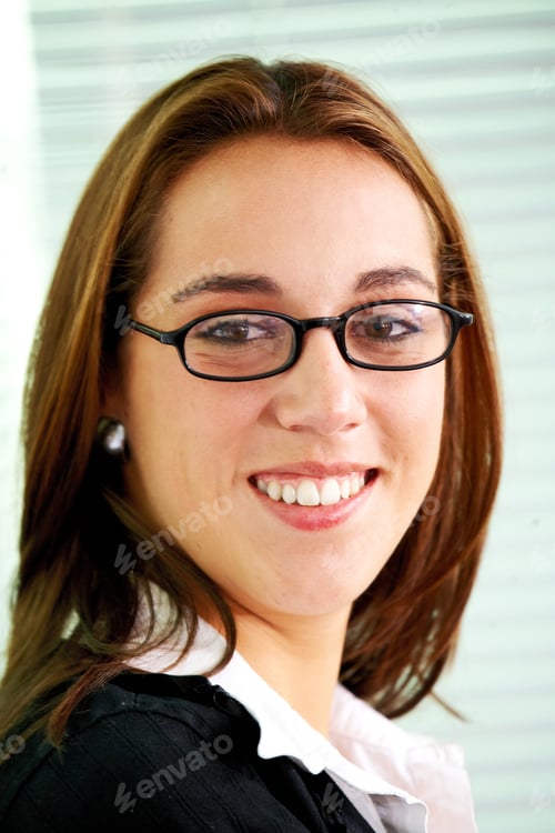Preview: Business Woman Portrait Smiling In An Office
