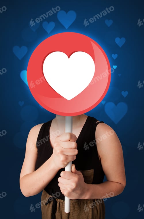 Preview: Casual Young Woman Holding Round Sign With Heart