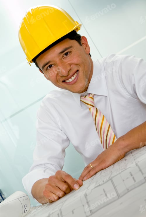 Preview: Male Architect At The Office Wearing A Helmet