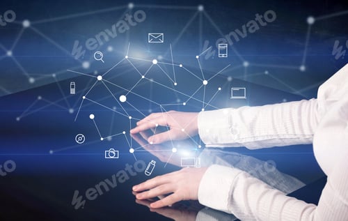 Preview: Male Hands Touching Interactive Table With Blue Mixed Communication Icons In The Background
