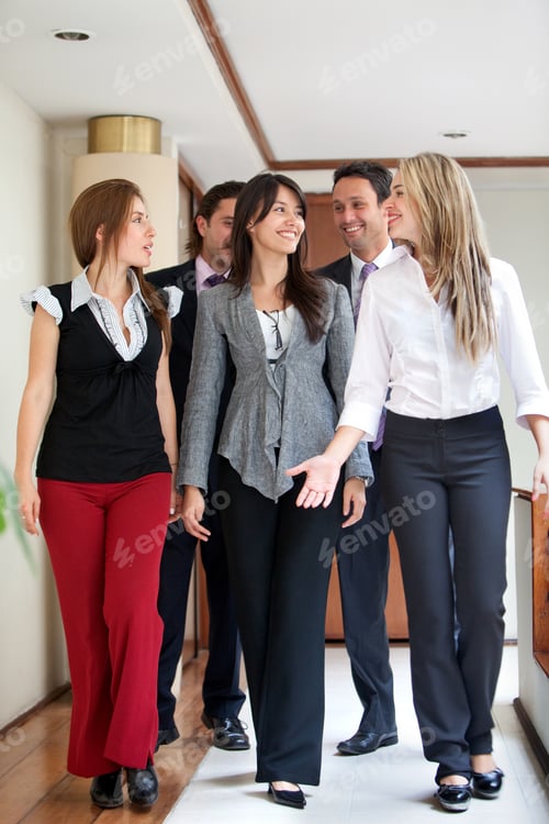Preview: Group Of Business Colleagues Walking In The Office