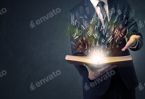 Preview: Businessman Holding Book With Letter Concept.