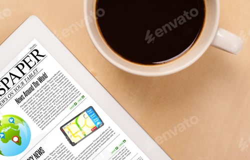 Preview: Workplace With Tablet Pc Showing News And A Cup Of Coffee On A Wooden Work Table Close-Up