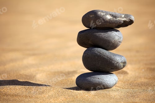 Preview: Balancing Stones On A Sunny Day At The Beach