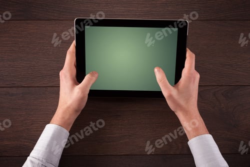 Preview: Caucasian Business Hands Holding And Working On Plain Tablet