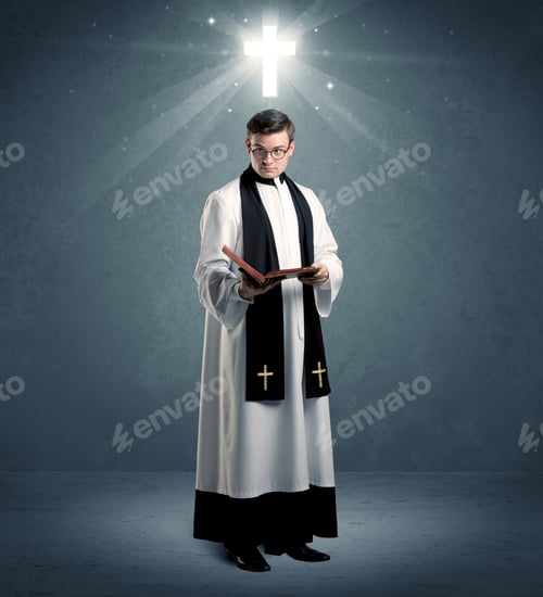 Preview: A Young Caucasian Priest With Deep Faith Blessing With The Holy Bible In His Hand In Front Of Blue