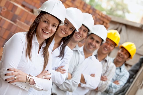 Preview: Group Of Engineers Smiling Lined Up In A Construction Site
