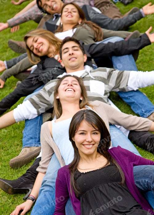 Preview: Happy Group Of Friends Smiling Outdoors In A Park