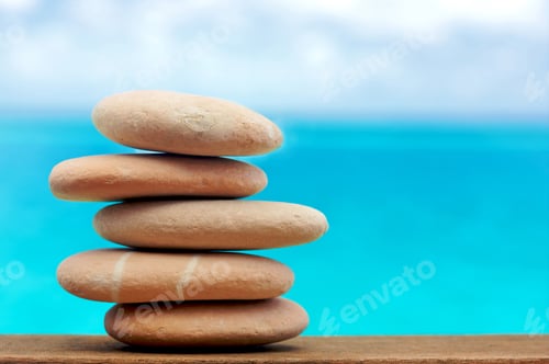 Preview: Balancing Beach Pebbles Or Stones With The Sea In The Background