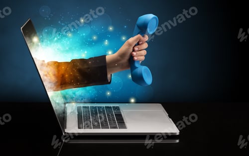 Preview: Hand With Phone Coming Out Of A Laptop With Sparkling Effects