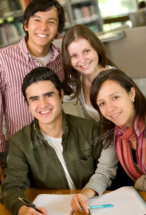 Preview: Casual Group Of College Students Smiling In The Library