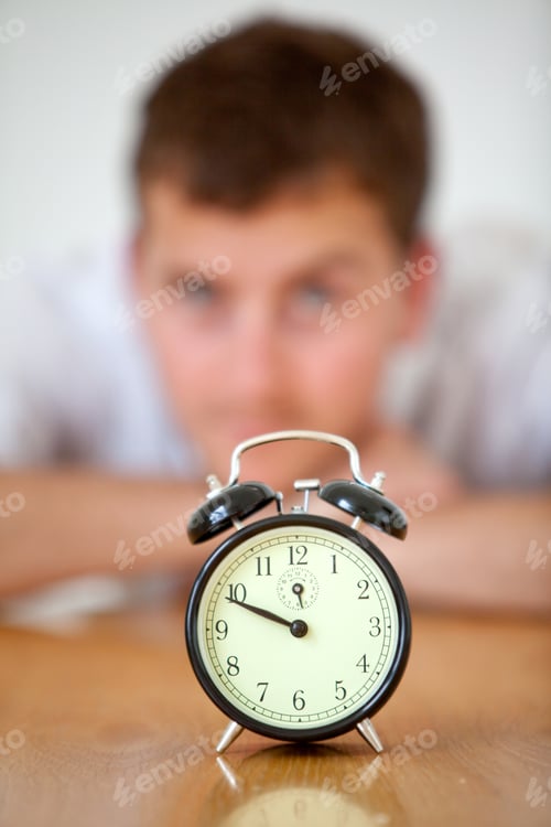 Preview: Business Man Staring At A Clock - Time Concepts