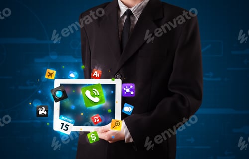 Preview: Young Businessman Holding A Tablet With Modern Colorful Apps And Icons
