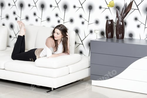 Preview: Beautiful Woman Relaxing In Her Elegant Living Room.