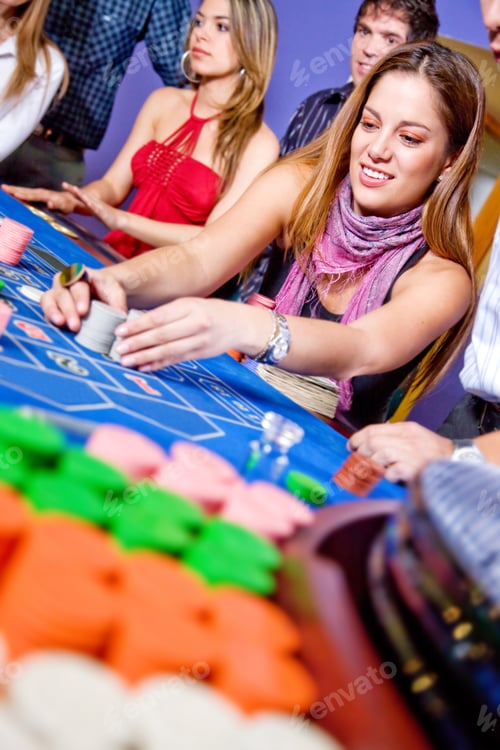 Preview: Group Of People On The Casino Roulette Table Playing
