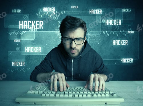 Preview: A Young Handsome Nerd Hacking Internet Web Sites While Working On Computer Keyboard, With Digital