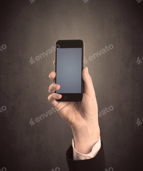 Preview: Caucasian Hand In Business Suit Holding A Blank Screen Smartphone