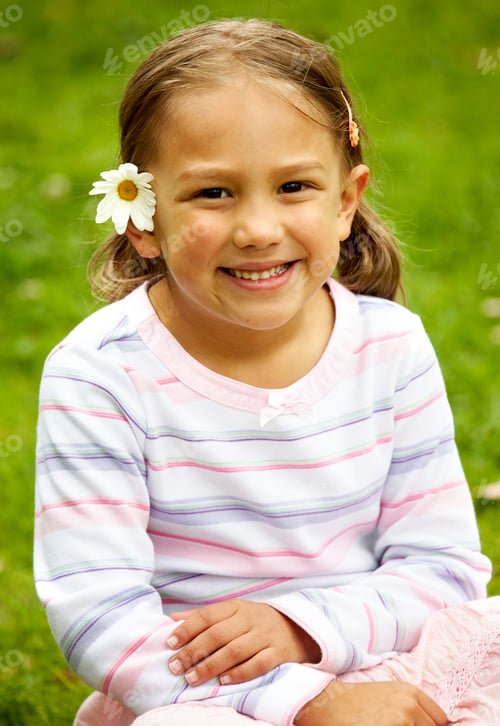 Preview: Beautiful Girl Smiling With A Flower On Her Ear