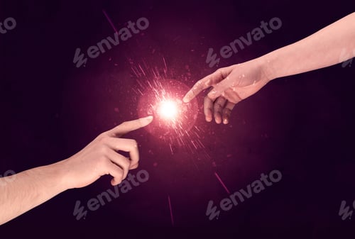 Preview: White Caucasian Male Hands Reaching Out With Fingers Almost Touching In Bright Red Light Sparkle In