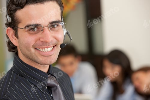 Preview: Male Support Operator Smiling In An Office