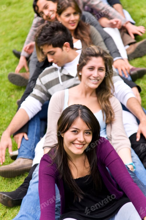 Preview: Casual Group Of Friends Leaning On Eachother Outdoors