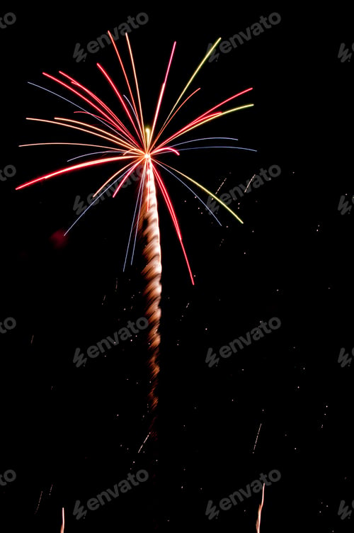 Preview: Multicolored Burst Of Fireworks With Feathery Rocket Trail And Sparks From Previous Explosion