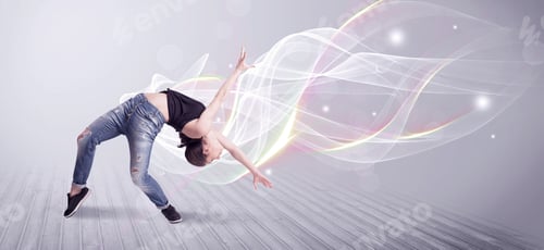 Preview: A Beautiful Young Hip Hop Dancer Dancing Contemporary Urban Street Dance In Front Of Grey Wall