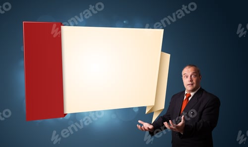Preview: Businessman In Suit Presenting Modern Origami Copy Space