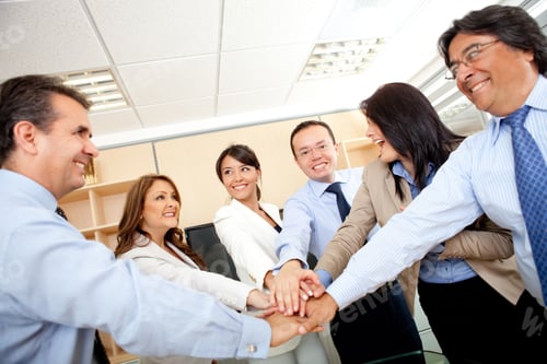 Preview: Business Group With Hands Together In The Middle - Teamwork Concepts