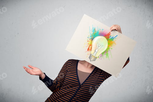Preview: Woman Holding A Cardboard With Coloured Paint Splashes And Lightbulb Concept In Front Of Her Head