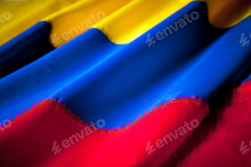 Preview: Abstract Close-Up of Yellow, Blue, and Red Fabric