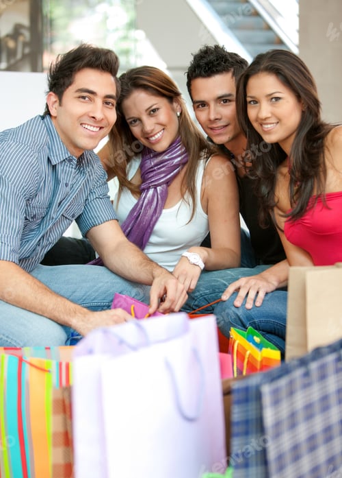 Preview: Group Of Friends Shopping In A Mall With Some Bags