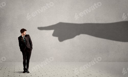 Preview: Business Person Looking At Huge Shadow Hand Pointing At Him Concept On Background