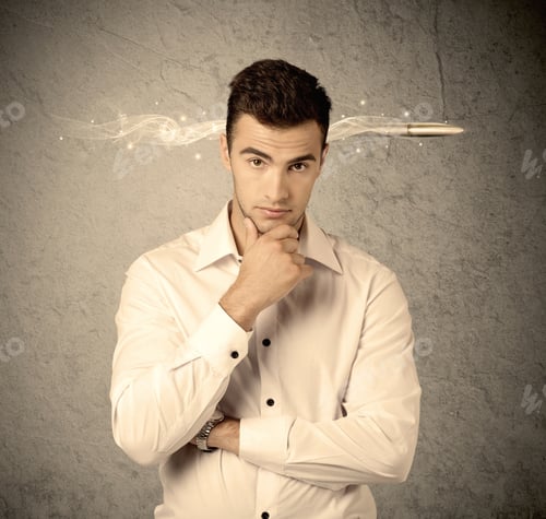 Preview: An Elegant Handsome Business Guy Standing In Front Of Wall With A Bullet Going Through His Head