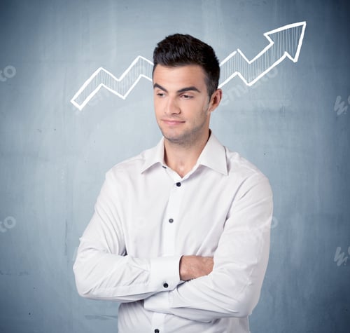 Preview: A Handsome Sales Guy Standing In Front Of A Blue Urban Concrete Wall With Illustration Of White