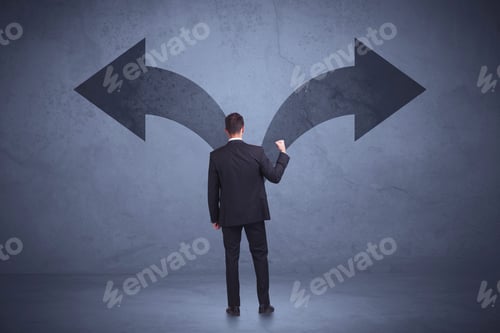 Preview: Businessman Taking A Decision While Looking At Arrows On The Wall Concept Background