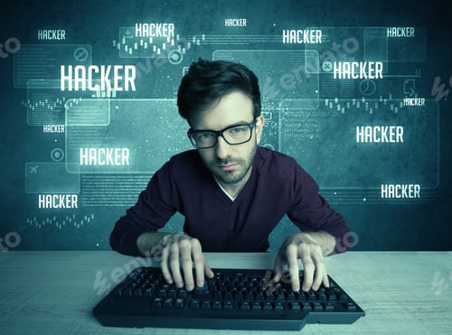 Preview: A Young Handsome Nerd Hacking Internet Web Sites While Working On Computer Keyboard, With Digital