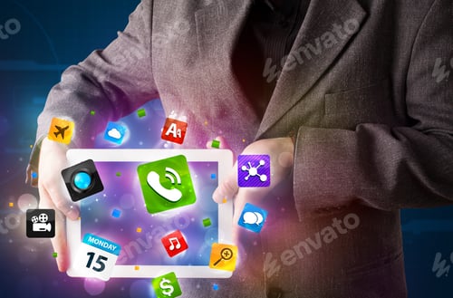 Preview: Young Businessman Holding A Tablet With Modern Colorful Apps And Icons