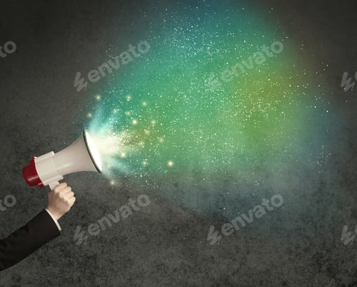 Preview: Caucasian Business Hand Holding Megaphone With White Sparkles On A Grunge Background