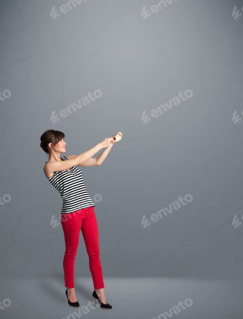 Preview: Pretty Young Lady Gesturing With Copy Space