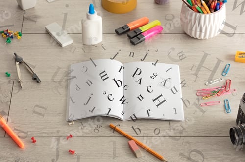 Preview: Open Notebook On The Floor With Office Instruments Nearby And Letters On It