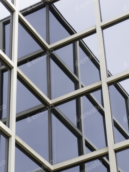 Preview: Reflecting Windows In Corner Of College Building