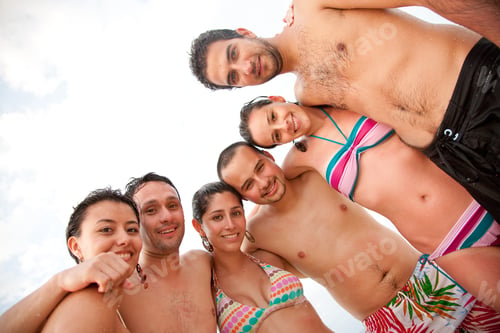 Preview: Group Of Friends Having Fun And Smiling At The Beach