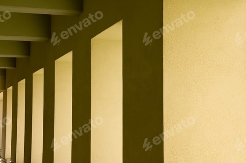 Preview: Alternating Sunlight And Shade Along Walkway Outside University Building