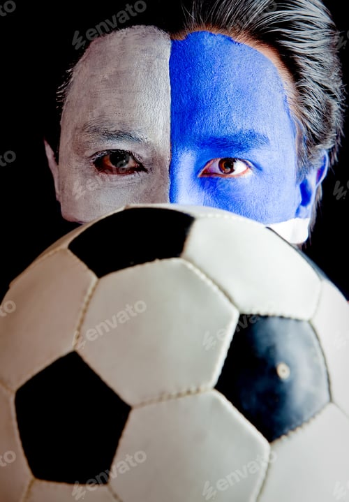 Preview: Football Fan With A Blue And White Flag Painted On His Face